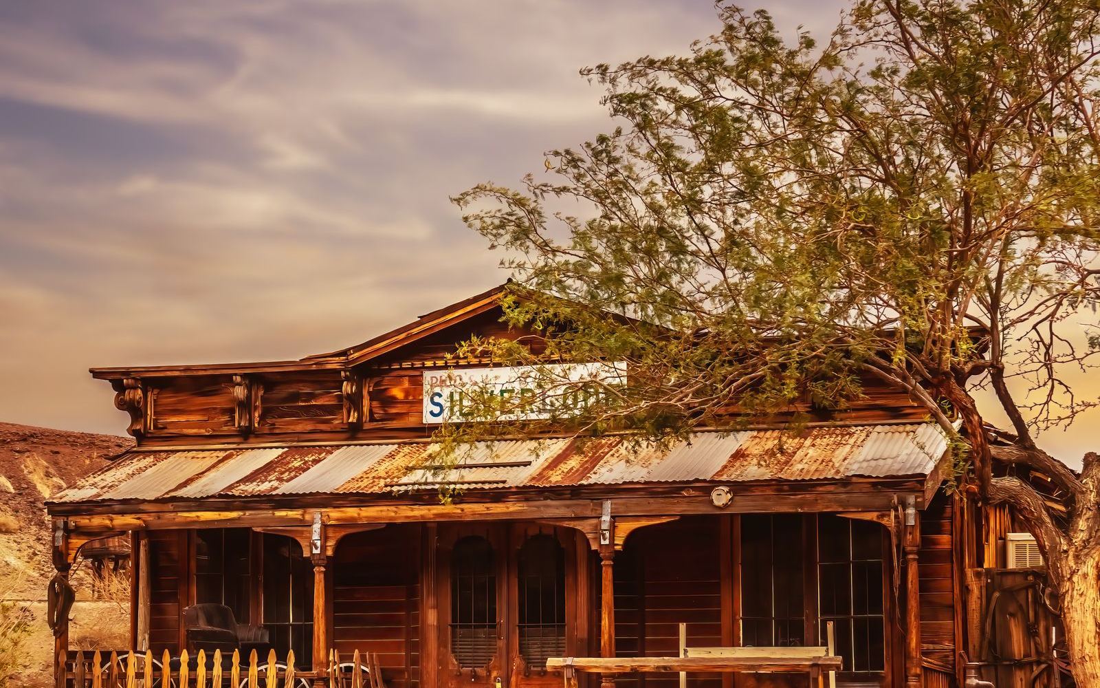 An old west main street with wooden storefronts